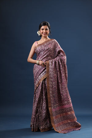 Shop mauve printed tussar silk sari online in USA with zari border. Make a fashion statement at weddings with stunning designer sarees, embroidered sarees with blouse, wedding sarees, handloom sarees from Pure Elegance Indian fashion store in USA.-front