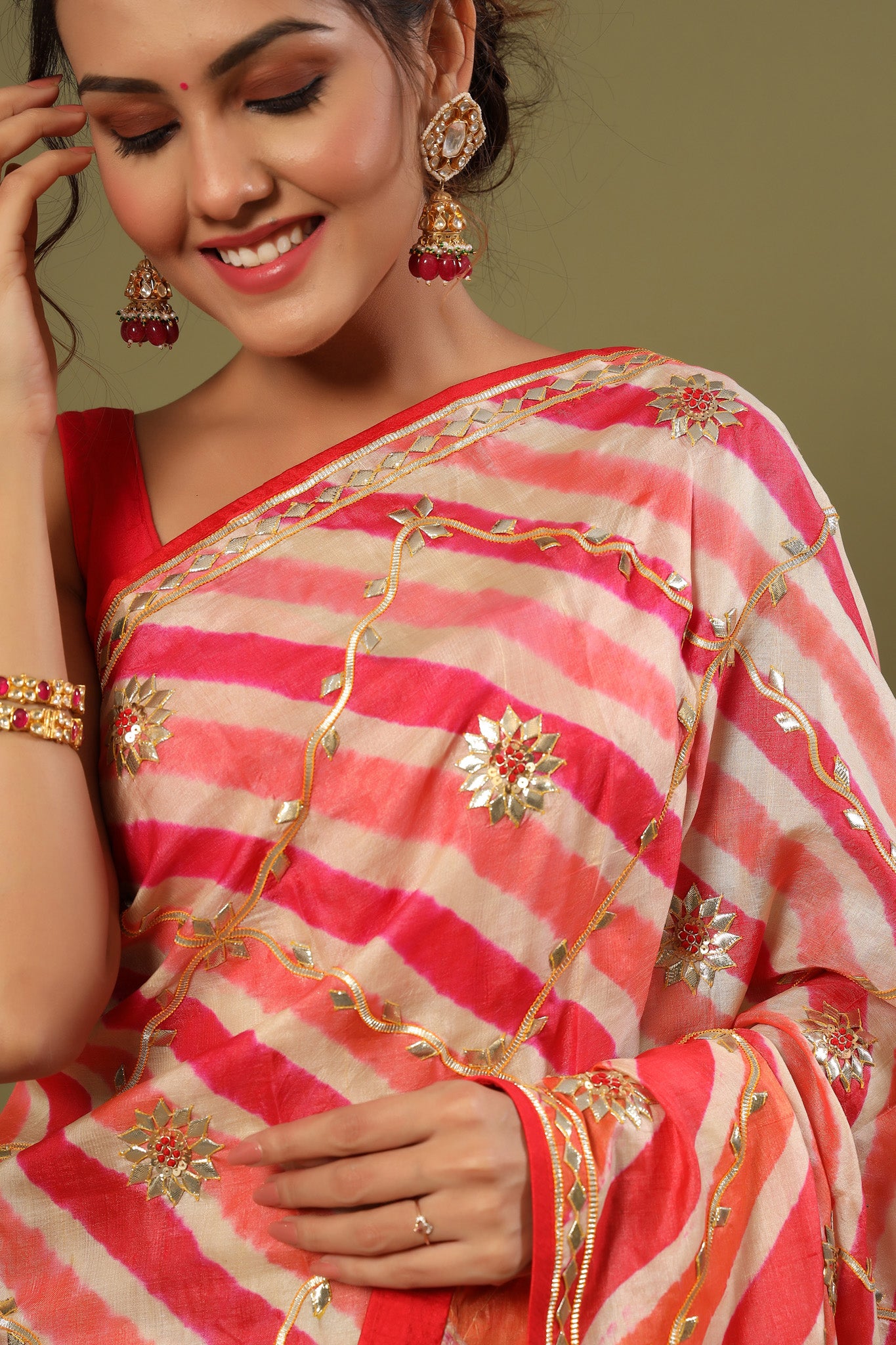 Shop light pink gota work striped organza sari online in USA. Make a fashion statement at weddings with stunning designer sarees, embroidered sarees with blouse, wedding sarees, handloom sarees from Pure Elegance Indian fashion store in USA.-closeup