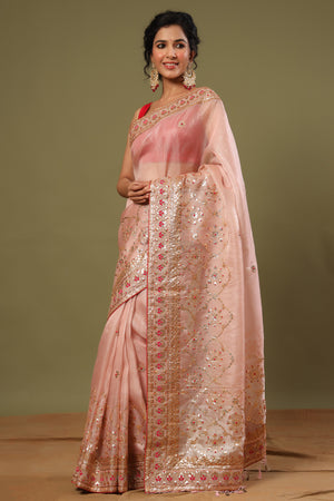 Shop light pink hand embroidery organza sari online in USA. Make a fashion statement at weddings with stunning designer sarees, embroidered sarees with blouse, wedding sarees, handloom sarees from Pure Elegance Indian fashion store in USA.-side