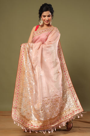 Shop light pink hand embroidery organza sari online in USA. Make a fashion statement at weddings with stunning designer sarees, embroidered sarees with blouse, wedding sarees, handloom sarees from Pure Elegance Indian fashion store in USA.-pallu