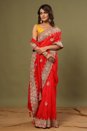 Buy stunning red hand embroidered organza sari online in USA. Make a fashion statement at weddings with stunning designer sarees, embroidered sarees with blouse, wedding sarees, handloom sarees from Pure Elegance Indian fashion store in USA.-front