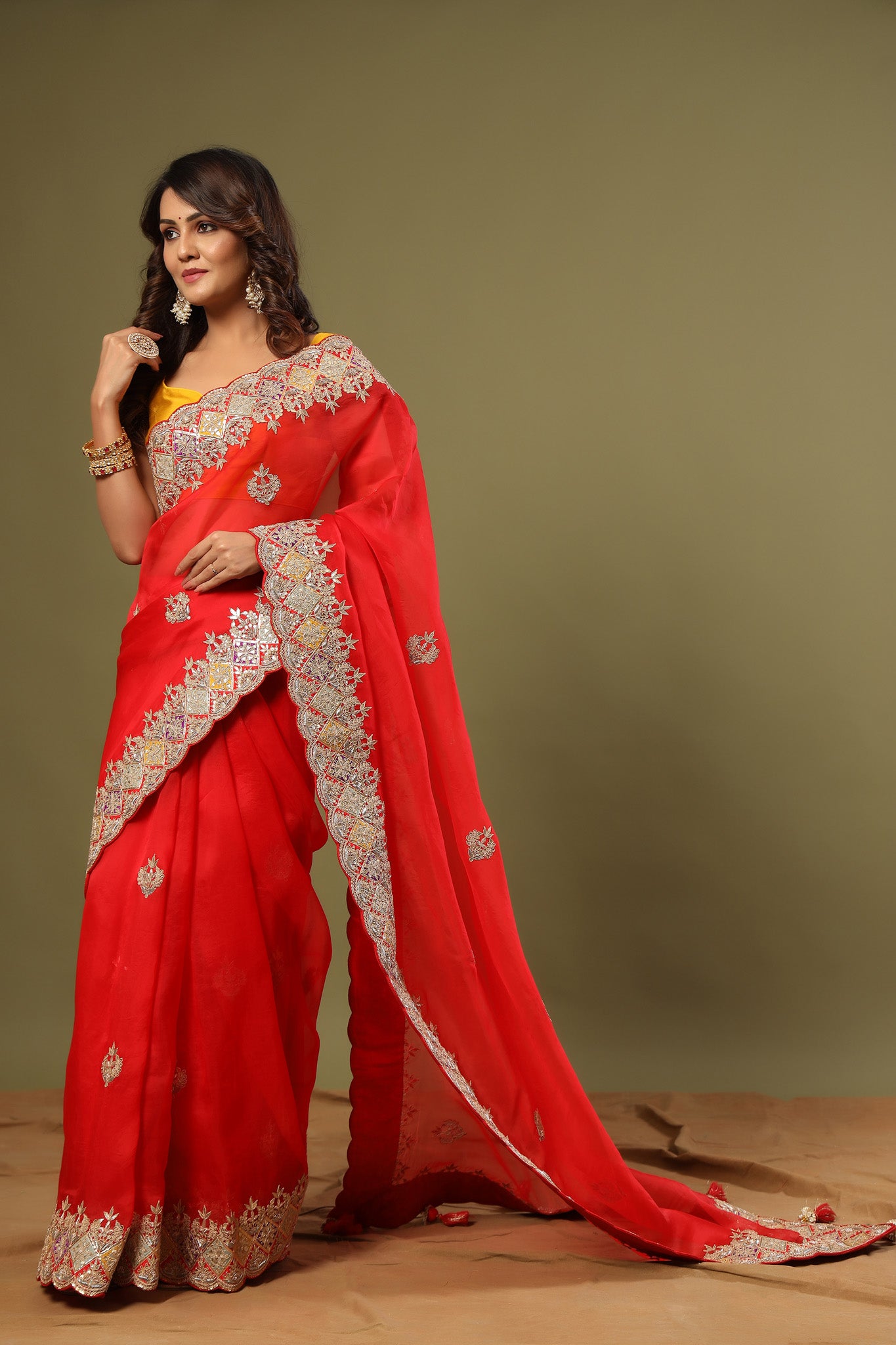 Buy stunning red hand embroidered organza sari online in USA. Make a fashion statement at weddings with stunning designer sarees, embroidered sarees with blouse, wedding sarees, handloom sarees from Pure Elegance Indian fashion store in USA.-side 