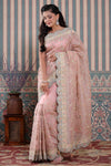 Shop light pink embroidered organza sari online in USA with scalloped border. Make a fashion statement at weddings with stunning designer sarees, embroidered sarees with blouse, wedding sarees, handloom sarees from Pure Elegance Indian fashion store in USA.-full view