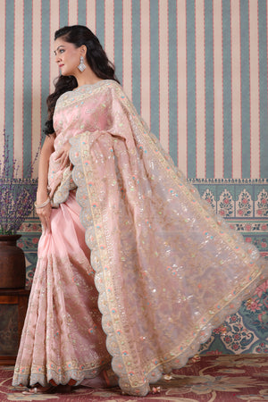 Shop light pink embroidered organza sari online in USA with scalloped border. Make a fashion statement at weddings with stunning designer sarees, embroidered sarees with blouse, wedding sarees, handloom sarees from Pure Elegance Indian fashion store in USA.-pallu
