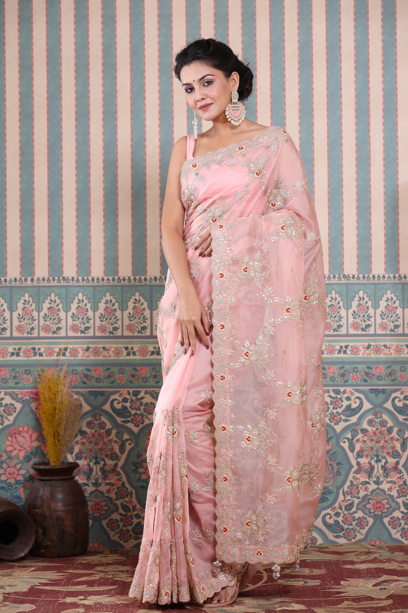 Buy stunning light pink embroidered organza sari online in USA. Make a fashion statement at weddings with stunning designer sarees, embroidered sarees with blouse, wedding sarees, handloom sarees from Pure Elegance Indian fashion store in USA.-pallu