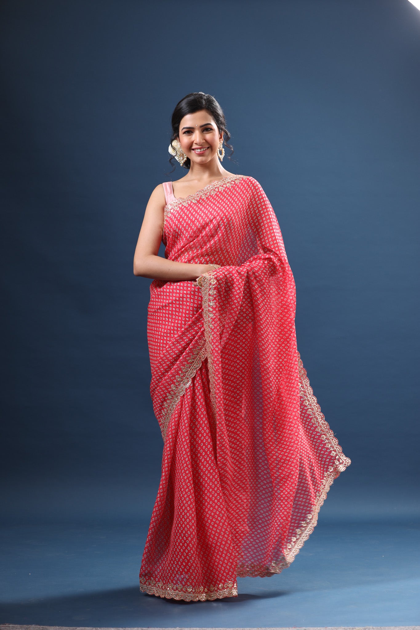 Shop pink printed organza sari online in USA with embroidered border. Make a fashion statement at weddings with stunning designer sarees, embroidered sarees with blouse, wedding sarees, handloom sarees from Pure Elegance Indian fashion store in USA.-front