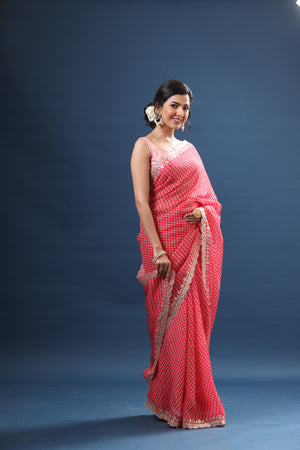 Shop pink printed organza sari online in USA with embroidered border. Make a fashion statement at weddings with stunning designer sarees, embroidered sarees with blouse, wedding sarees, handloom sarees from Pure Elegance Indian fashion store in USA.-side