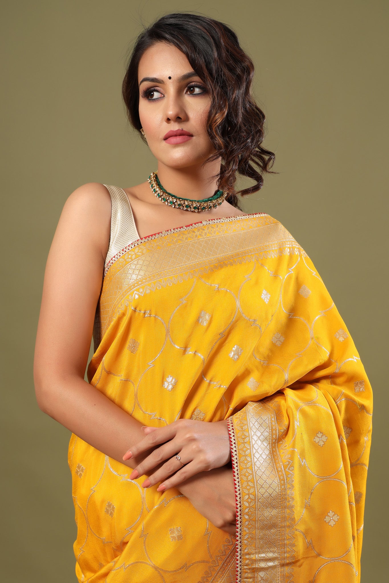 Buy stunning mango yellow Banarasi sari online in USA with zari jaal. Make a fashion statement at weddings with stunning designer sarees, embroidered sarees with blouse, wedding sarees, handloom sarees from Pure Elegance Indian fashion store in USA.-closeup