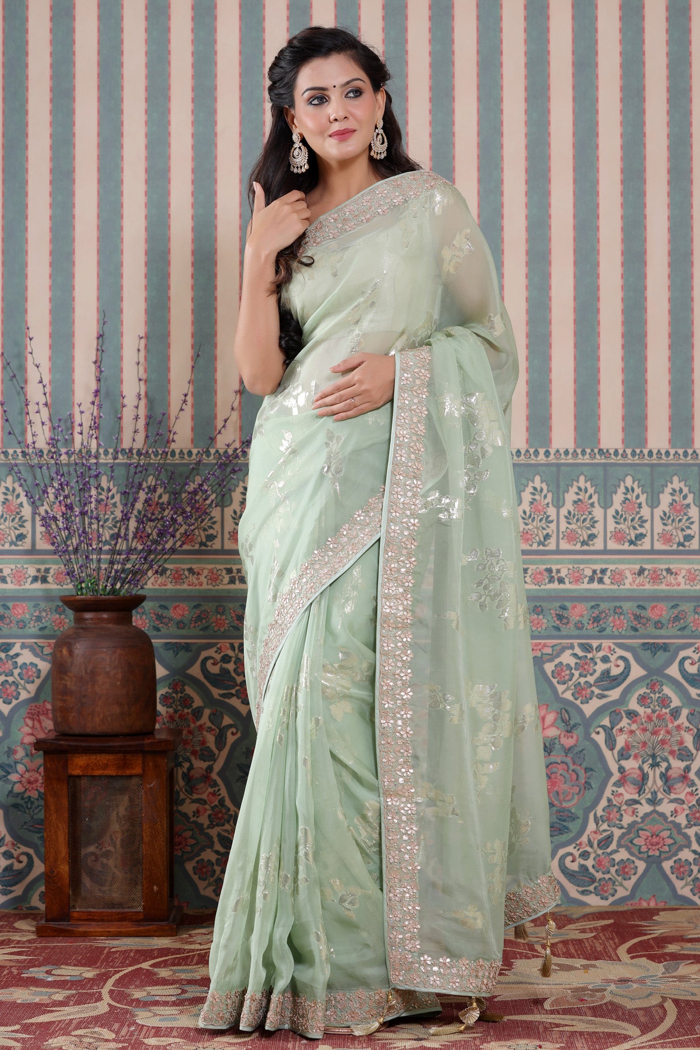 Shop beautiful pastel green embroidered organza silk sari online in USA. Make a fashion statement at weddings with stunning designer sarees, embroidered sarees with blouse, wedding sarees, handloom sarees from Pure Elegance Indian fashion store in USA.-front