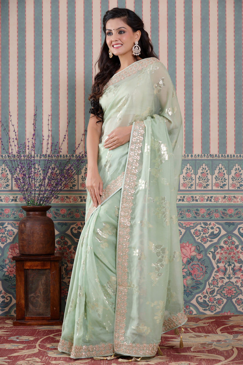 Shop beautiful pastel green embroidered organza silk sari online in USA. Make a fashion statement at weddings with stunning designer sarees, embroidered sarees with blouse, wedding sarees, handloom sarees from Pure Elegance Indian fashion store in USA.-full view