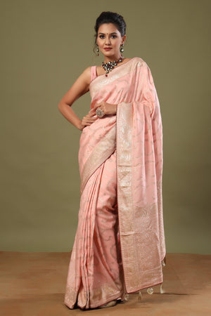 Buy beautiful light pink tussar georgette sari online in USA. Make a fashion statement at weddings with stunning designer sarees, embroidered sarees with blouse, wedding sarees, handloom sarees from Pure Elegance Indian fashion store in USA.-front
