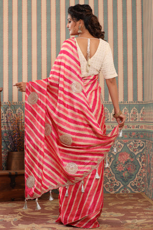 Shop pink striped tussar silk sari online in USA with saree blouse.. Make a fashion statement at weddings with stunning designer sarees, embroidered sarees with blouse, wedding sarees, handloom sarees from Pure Elegance Indian fashion store in USA.-back