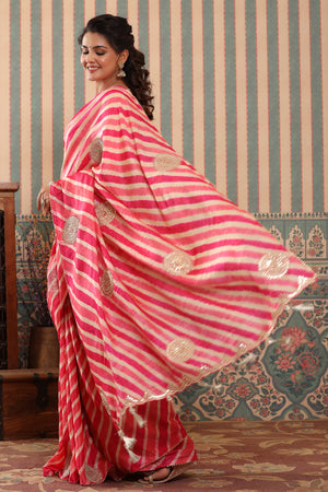 Shop pink striped tussar silk sari online in USA with saree blouse.. Make a fashion statement at weddings with stunning designer sarees, embroidered sarees with blouse, wedding sarees, handloom sarees from Pure Elegance Indian fashion store in USA.-pallu