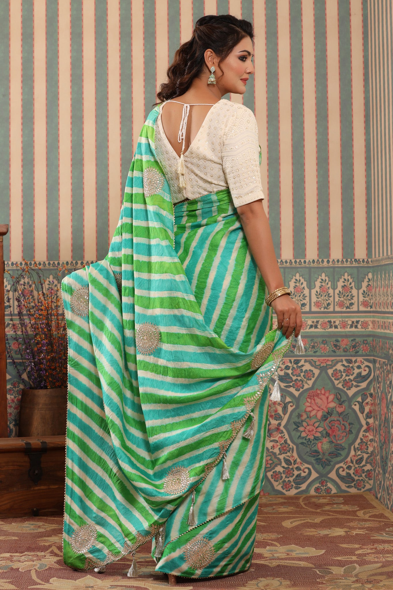 Buy green striped tussar silk sari online in USA with saree blouse.. Make a fashion statement at weddings with stunning designer sarees, embroidered sarees with blouse, wedding sarees, handloom sarees from Pure Elegance Indian fashion store in USA.-back