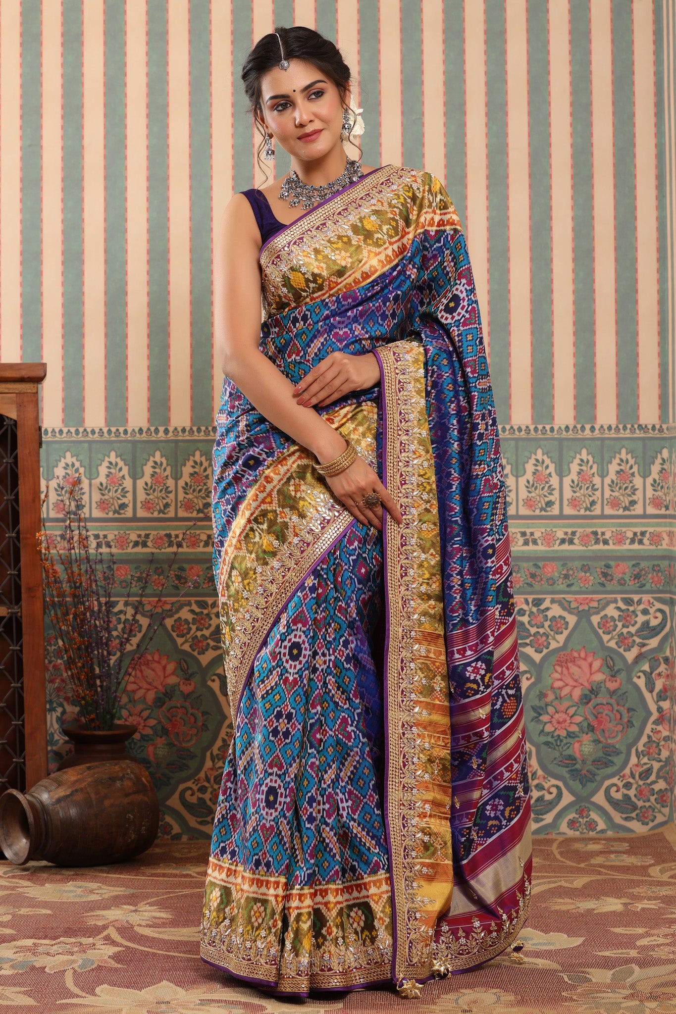 Shop blue Patola silk sari online in USA with embroidered zari border. Make a fashion statement at weddings with stunning designer sarees, embroidered sarees with blouse, wedding sarees, handloom sarees from Pure Elegance Indian fashion store in USA.-full view