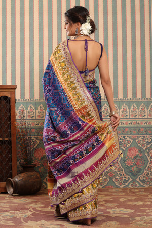 Shop blue Patola silk sari online in USA with embroidered zari border. Make a fashion statement at weddings with stunning designer sarees, embroidered sarees with blouse, wedding sarees, handloom sarees from Pure Elegance Indian fashion store in USA.-back