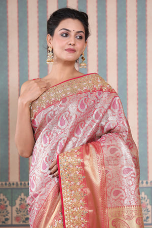 Shop beautiful pink Banarasi silk sari online in USA with gota work border. Make a fashion statement at weddings with stunning designer sarees, embroidered sarees with blouse, wedding sarees, handloom sarees from Pure Elegance Indian fashion store in USA.-closeup