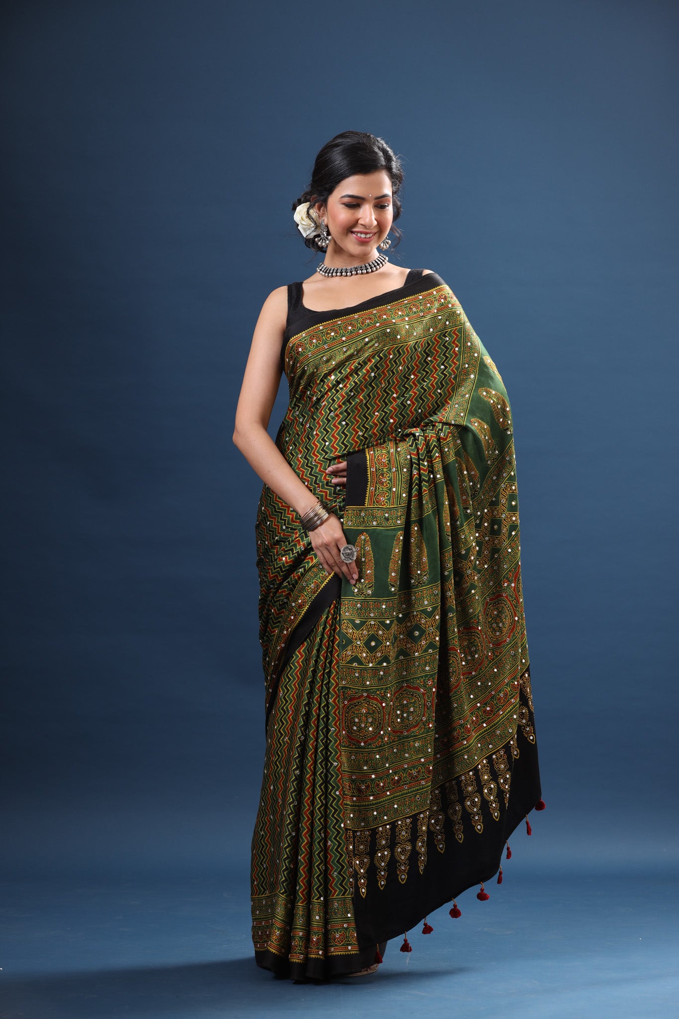 Shop elegant mehendi green printed modal silk sari online in USA. Make a fashion statement at weddings with stunning designer sarees, embroidered sarees with blouse, wedding sarees, handloom sarees from Pure Elegance Indian fashion store in USA.-saree