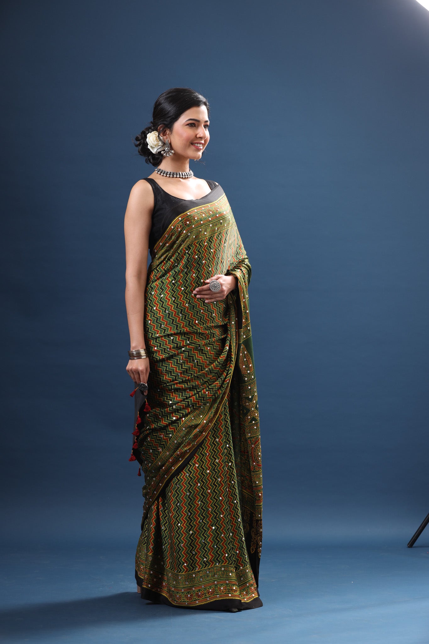 Shop elegant mehendi green printed modal silk sari online in USA. Make a fashion statement at weddings with stunning designer sarees, embroidered sarees with blouse, wedding sarees, handloom sarees from Pure Elegance Indian fashion store in USA.-side