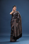 Shop stunning black printed modal silk sari online in USA. Make a fashion statement at weddings with stunning designer sarees, embroidered sarees with blouse, wedding sarees, handloom sarees from Pure Elegance Indian fashion store in USA.-full view