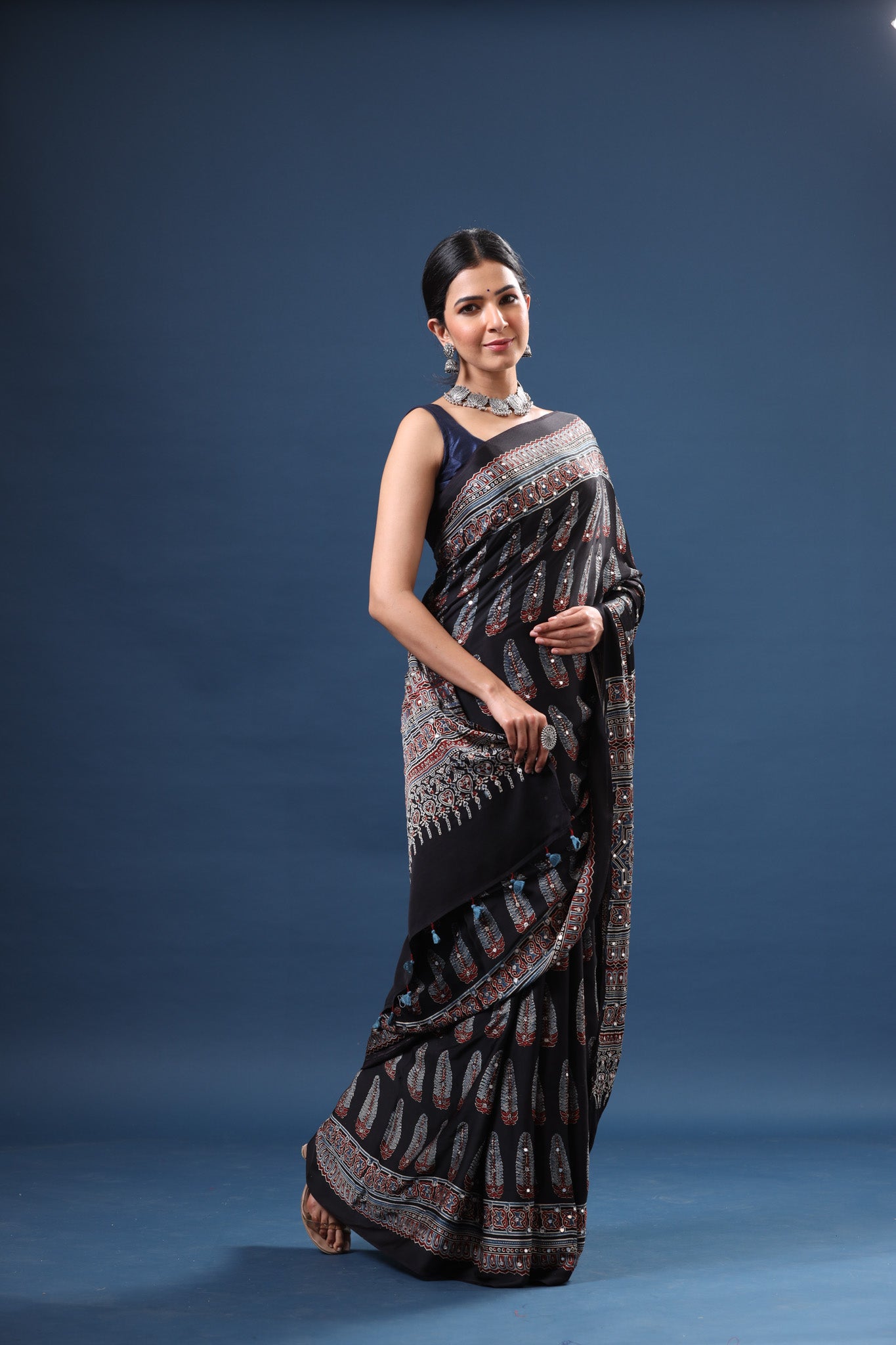 Shop stunning black printed modal silk sari online in USA. Make a fashion statement at weddings with stunning designer sarees, embroidered sarees with blouse, wedding sarees, handloom sarees from Pure Elegance Indian fashion store in USA.-saree