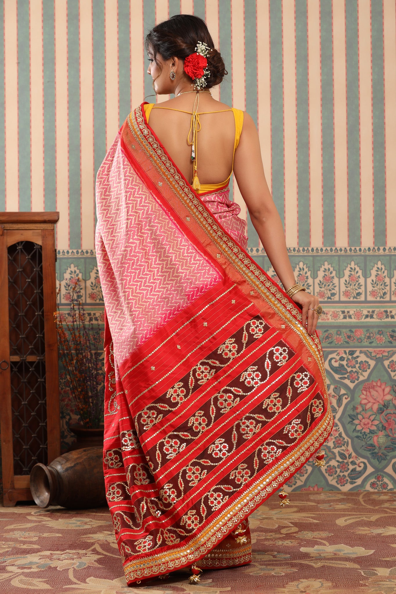 Shop pink Patola silk sari online in USA with embroidered border. Make a fashion statement at weddings with stunning designer sarees, embroidered sarees with blouse, wedding sarees, handloom sarees from Pure Elegance Indian fashion store in USA.-back