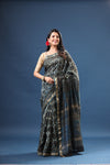 Buy blue printed tussar silk silk sari online in USA with zari border. Make a fashion statement at weddings with stunning designer sarees, embroidered sarees with blouse, wedding sarees, handloom sarees from Pure Elegance Indian fashion store in USA.-full view