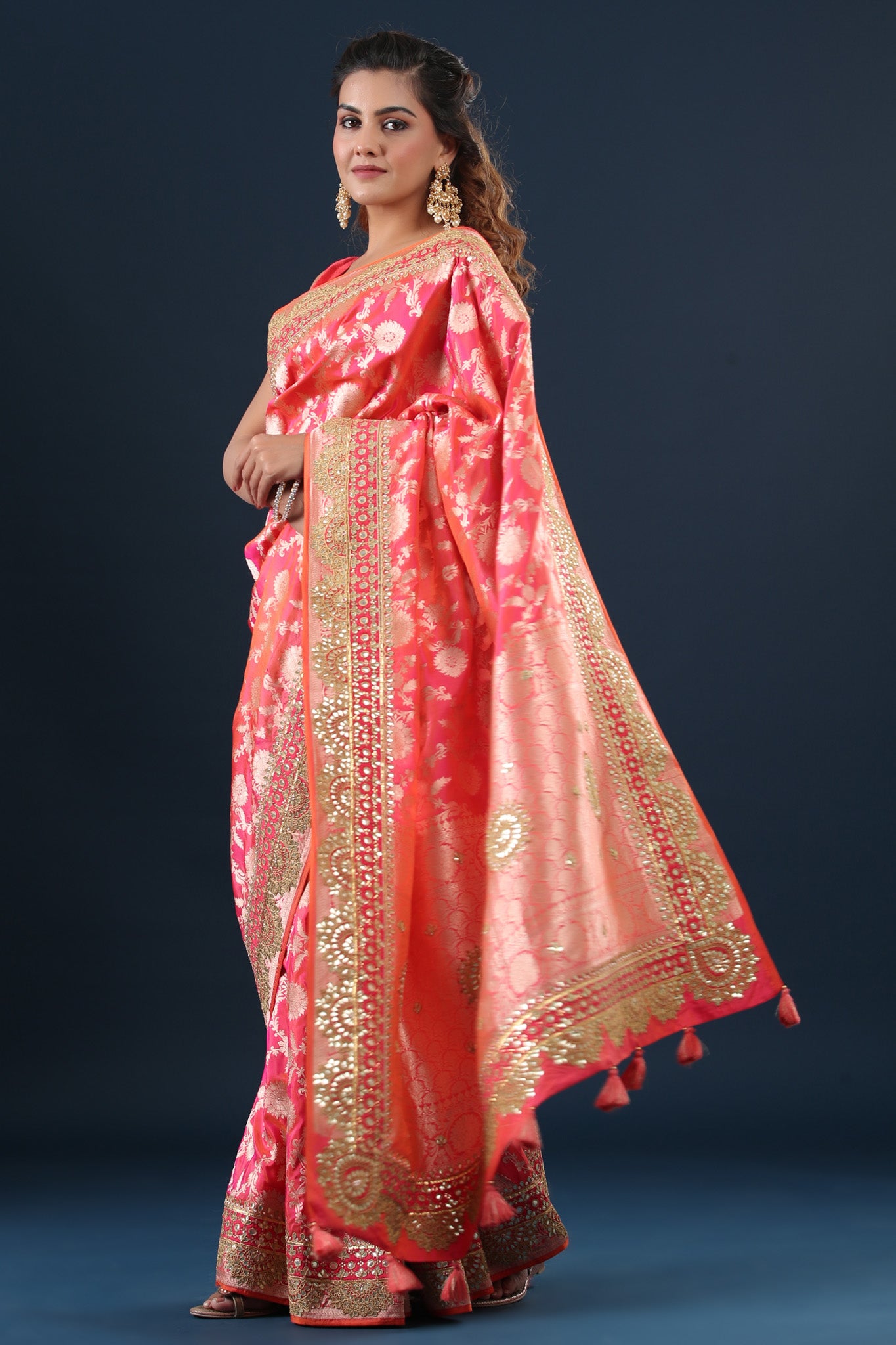 Buy peachish pink Banarasi silk sari online in USA with embroidered border. Make a fashion statement at weddings with stunning designer sarees, embroidered sarees with blouse, wedding sarees, handloom sarees from Pure Elegance Indian fashion store in USA.-pallu