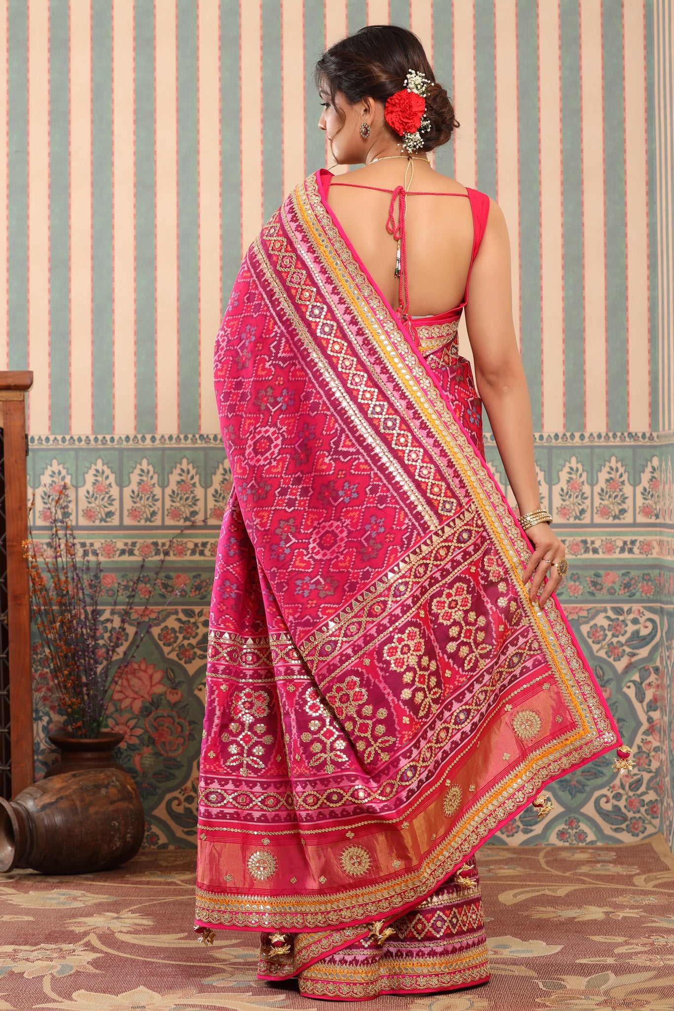 Shop pink Patola silk sari online in USA with embroidered border. Make a fashion statement at weddings with stunning designer sarees, embroidered sarees with blouse, wedding sarees, handloom sarees from Pure Elegance Indian fashion store in USA.-back