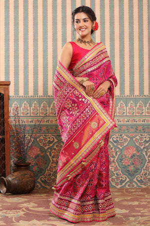Shop pink Patola silk sari online in USA with embroidered border. Make a fashion statement at weddings with stunning designer sarees, embroidered sarees with blouse, wedding sarees, handloom sarees from Pure Elegance Indian fashion store in USA.-side