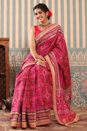 Shop pink Patola silk sari online in USA with embroidered border. Make a fashion statement at weddings with stunning designer sarees, embroidered sarees with blouse, wedding sarees, handloom sarees from Pure Elegance Indian fashion store in USA.-saree