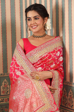 Buy pink Banarasi silk sari online in USA with embroidered border. Make a fashion statement at weddings with stunning designer sarees, embroidered sarees with blouse, wedding sarees, handloom sarees from Pure Elegance Indian fashion store in USA.-closeup