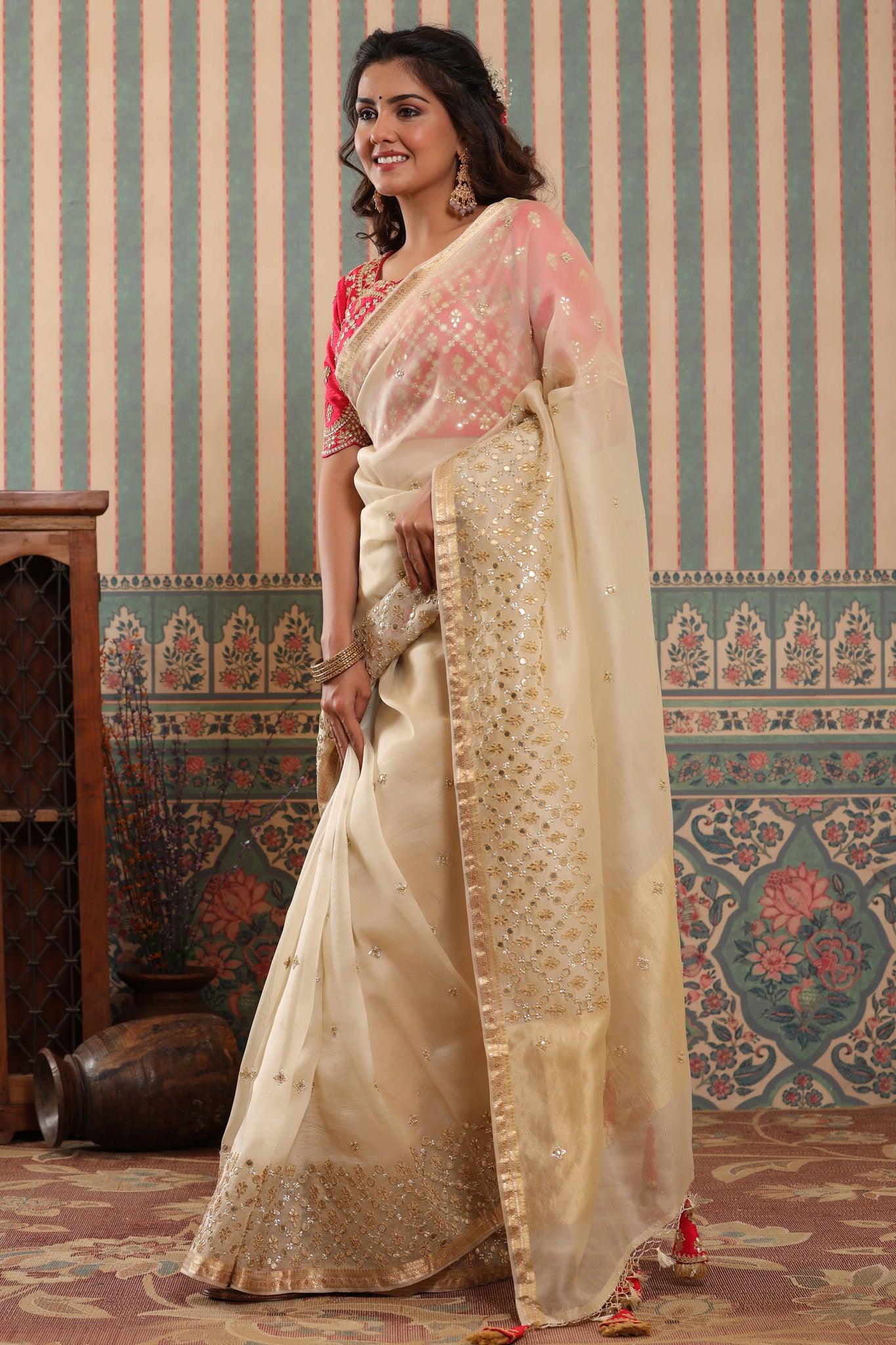 Shop cream organza silk sari online in USA with gota work border. Make a fashion statement at weddings with stunning designer sarees, embroidered sarees with blouse, wedding sarees, handloom sarees from Pure Elegance Indian fashion store in USA.-pallu