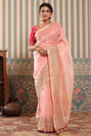 Shop powder pink organza silk sari online in USA with gota work border. Make a fashion statement at weddings with stunning designer sarees, embroidered sarees with blouse, wedding sarees, handloom sarees from Pure Elegance Indian fashion store in USA.-full view