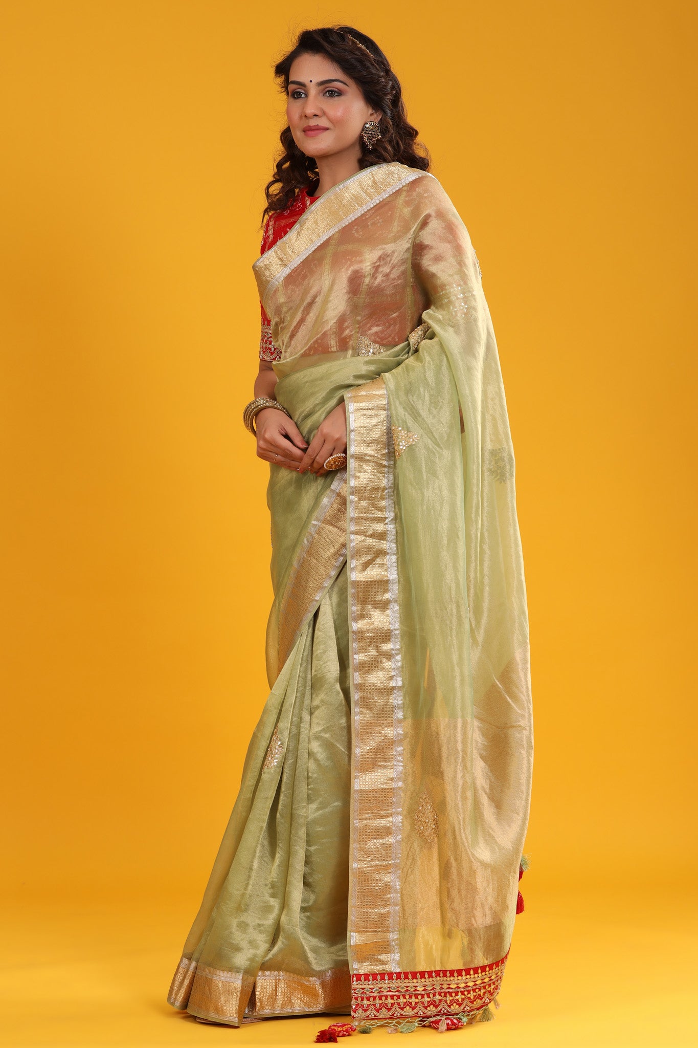 Shop pista green embroidered organza Banarasi sari online in USA with zari border. Make a fashion statement at weddings with stunning designer sarees, embroidered sarees with blouse, wedding sarees, handloom sarees from Pure Elegance Indian fashion store in USA.-pallu