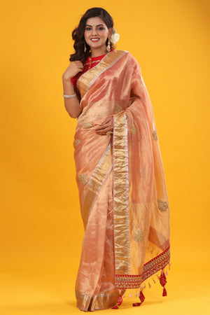Shop peach golden organza Banarasi sari online in USA with zari border. Make a fashion statement at weddings with stunning designer sarees, embroidered sarees with blouse, wedding sarees, handloom sarees from Pure Elegance Indian fashion store in USA.-front