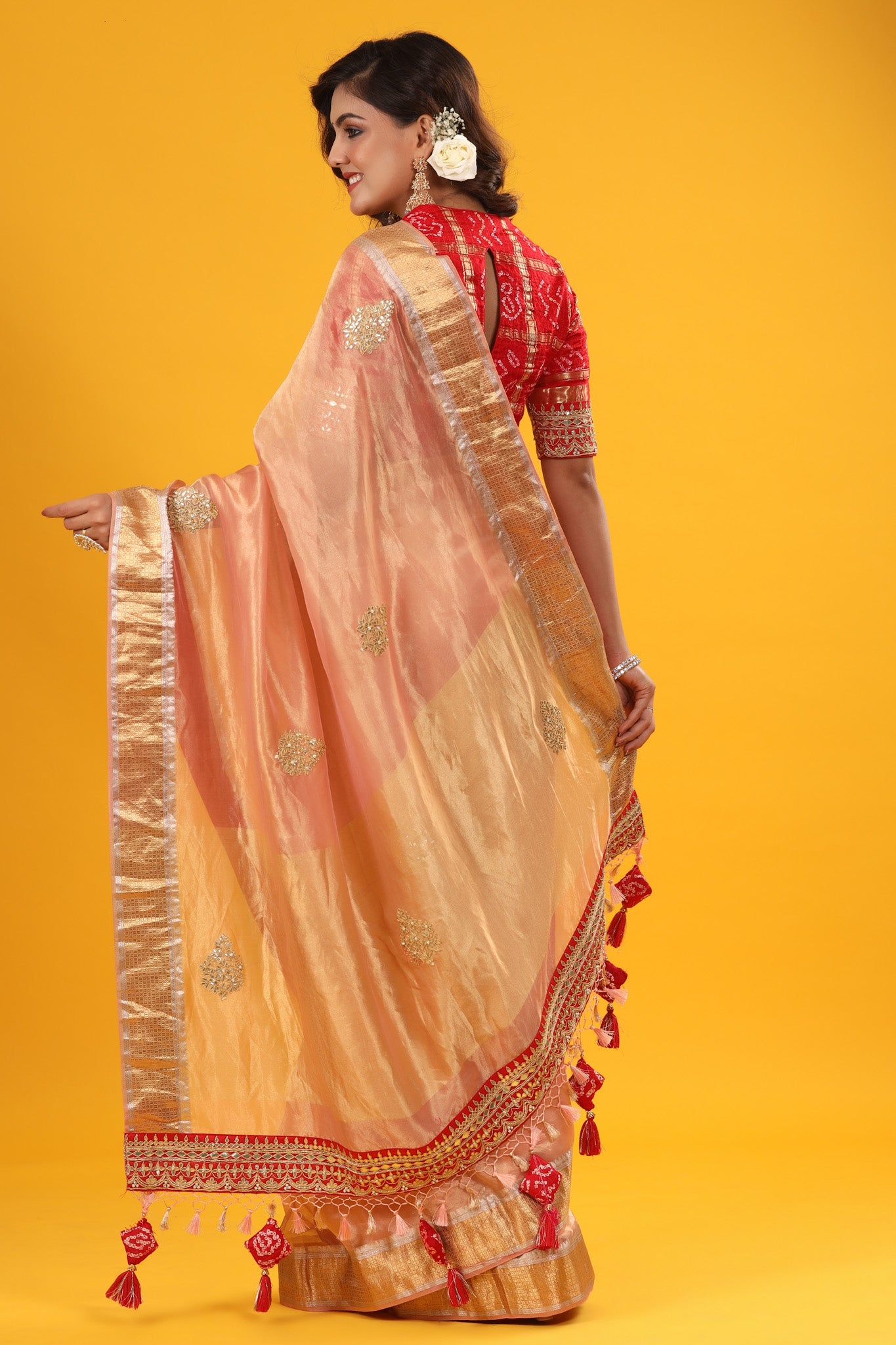 Shop peach golden organza Banarasi sari online in USA with zari border. Make a fashion statement at weddings with stunning designer sarees, embroidered sarees with blouse, wedding sarees, handloom sarees from Pure Elegance Indian fashion store in USA.-back