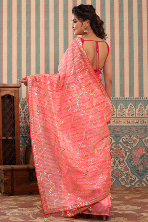Buy pink and orange organza sari online in USA with gota work. Make a fashion statement at weddings with stunning designer sarees, embroidered sarees with blouse, wedding sarees, handloom sarees from Pure Elegance Indian fashion store in USA.-back
