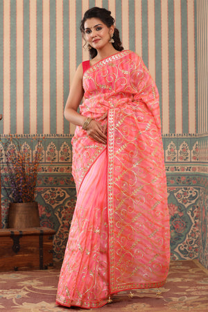 Buy pink and orange organza sari online in USA with gota work. Make a fashion statement at weddings with stunning designer sarees, embroidered sarees with blouse, wedding sarees, handloom sarees from Pure Elegance Indian fashion store in USA.-front