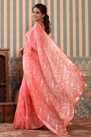Buy pink and orange organza sari online in USA with gota work. Make a fashion statement at weddings with stunning designer sarees, embroidered sarees with blouse, wedding sarees, handloom sarees from Pure Elegance Indian fashion store in USA.-pallu