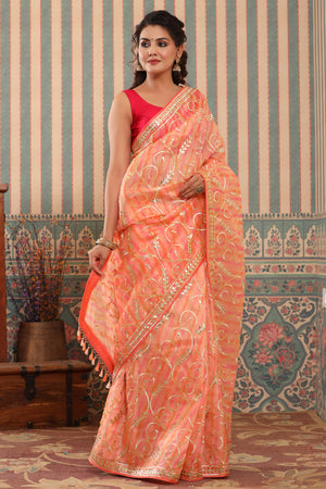 Shop pink and peach organza sari online in USA with gota work. Make a fashion statement at weddings with stunning designer sarees, embroidered sarees with blouse, wedding sarees, handloom sarees from Pure Elegance Indian fashion store in USA.-side