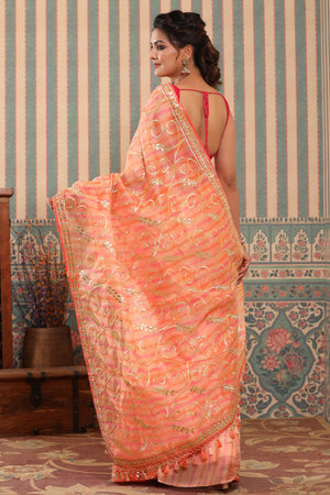 Shop pink and peach organza sari online in USA with gota work. Make a fashion statement at weddings with stunning designer sarees, embroidered sarees with blouse, wedding sarees, handloom sarees from Pure Elegance Indian fashion store in USA.-back