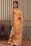 Shop beautiful yellow and peach organza sari online in USA with gota patti border. Make a fashion statement at weddings with stunning designer sarees, embroidered sarees with blouse, wedding sarees, handloom sarees from Pure Elegance Indian fashion store in USA.-full view