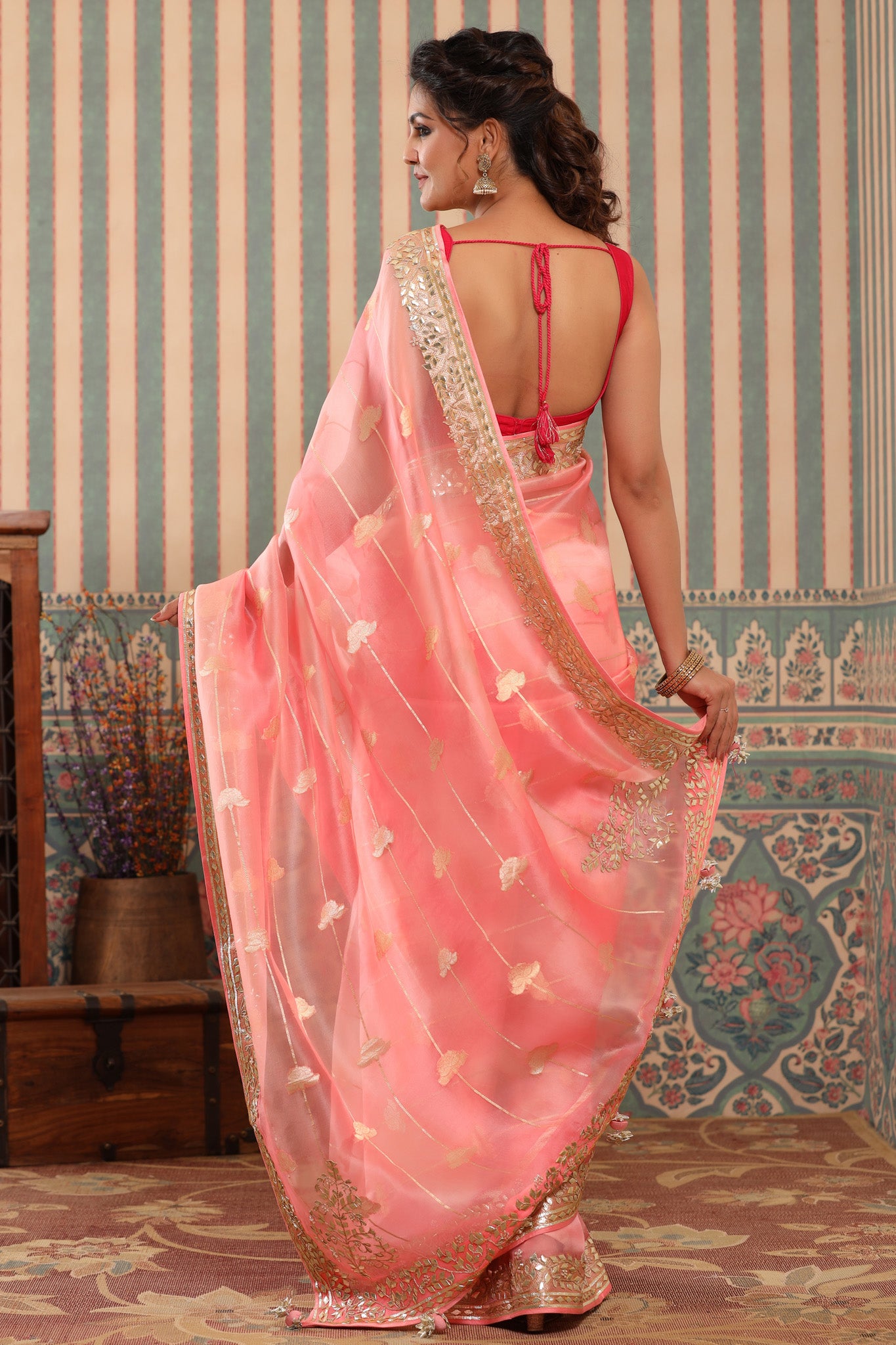 Buy pink organza sari online in USA with gota patti border. Make a fashion statement at weddings with stunning designer sarees, embroidered sarees with blouse, wedding sarees, handloom sarees from Pure Elegance Indian fashion store in USA.-back