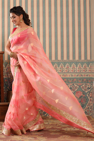 Buy pink organza sari online in USA with gota patti border. Make a fashion statement at weddings with stunning designer sarees, embroidered sarees with blouse, wedding sarees, handloom sarees from Pure Elegance Indian fashion store in USA.-pallu