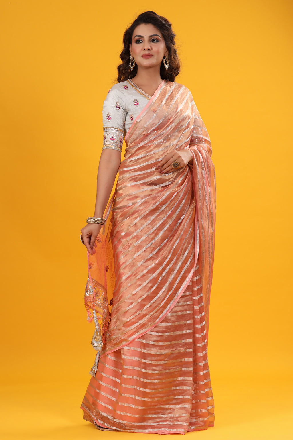 Shop beautiful peach silver striped embroidered organza sari online in USA. Make a fashion statement at weddings with stunning designer sarees, embroidered sarees with blouse, wedding sarees, handloom sarees from Pure Elegance Indian fashion store in USA.-full view