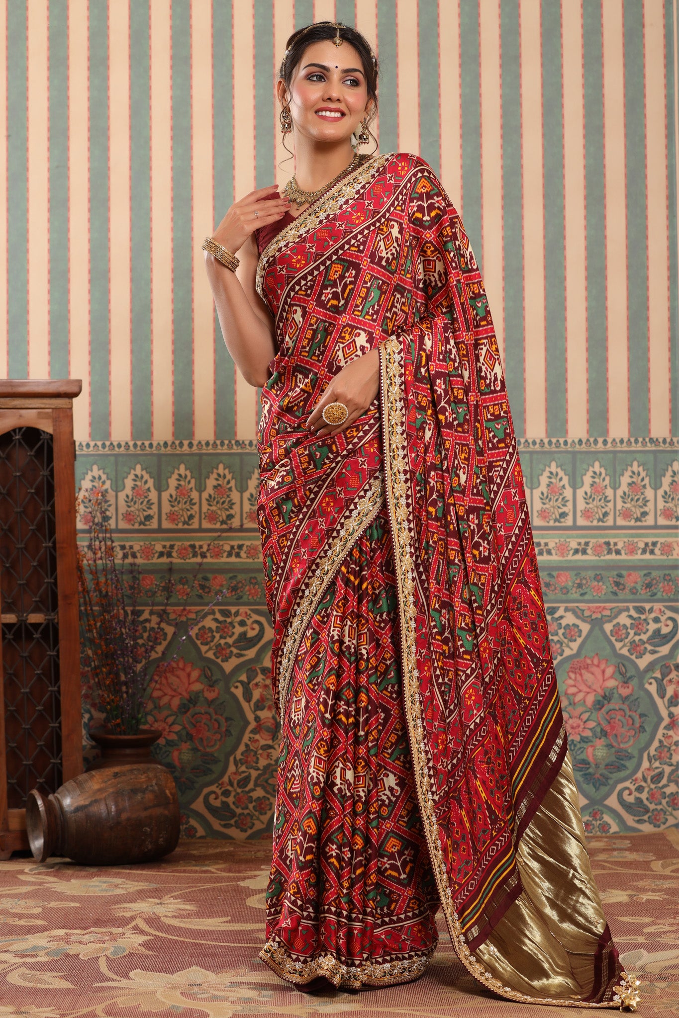 Shop red Patola sari online in USA with embroidered border. Make a fashion statement at weddings with stunning designer sarees, embroidered sarees with blouse, wedding sarees, handloom sarees from Pure Elegance Indian fashion store in USA.-pallu