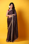 Shop brown printed georgette sari online in USA with lace border. Make a fashion statement at weddings with stunning designer sarees, embroidered sarees with blouse, wedding sarees, handloom sarees from Pure Elegance Indian fashion store in USA.-full view