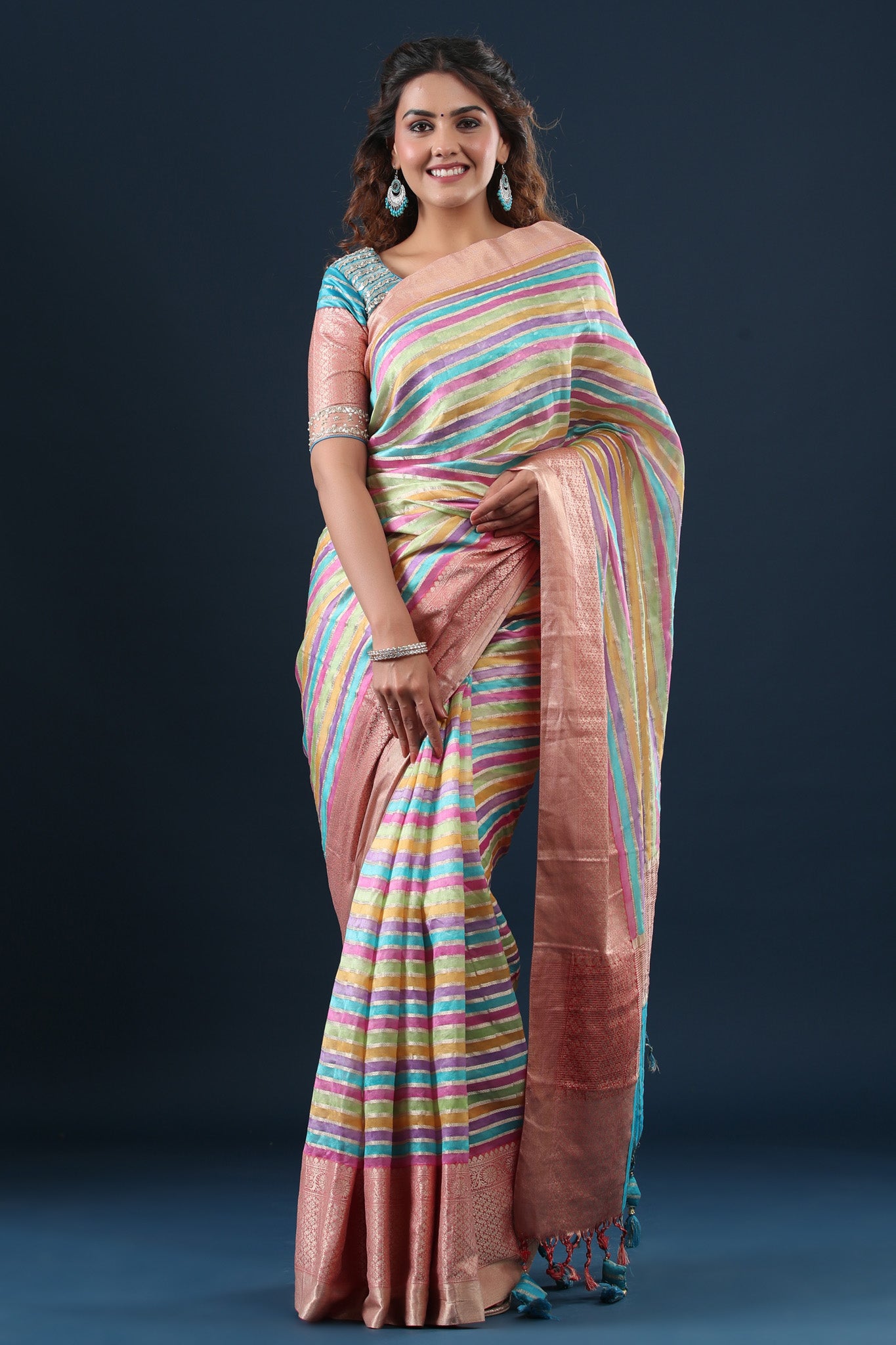 Shop pastel multicolor stripes linen sari online in USA with zari border. Make a fashion statement at weddings with stunning designer sarees, embroidered sarees with blouse, wedding sarees, handloom sarees from Pure Elegance Indian fashion store in USA.-front