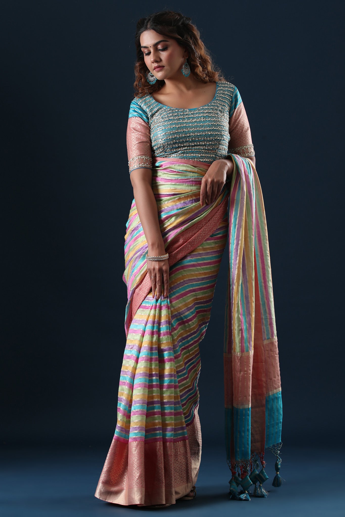 Shop pastel multicolor stripes linen sari online in USA with zari border. Make a fashion statement at weddings with stunning designer sarees, embroidered sarees with blouse, wedding sarees, handloom sarees from Pure Elegance Indian fashion store in USA.-blouse